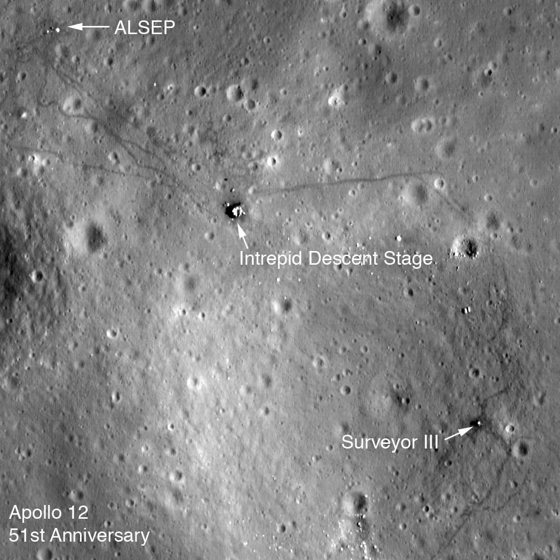 Apollo 12 landing site showing hardware and tracks